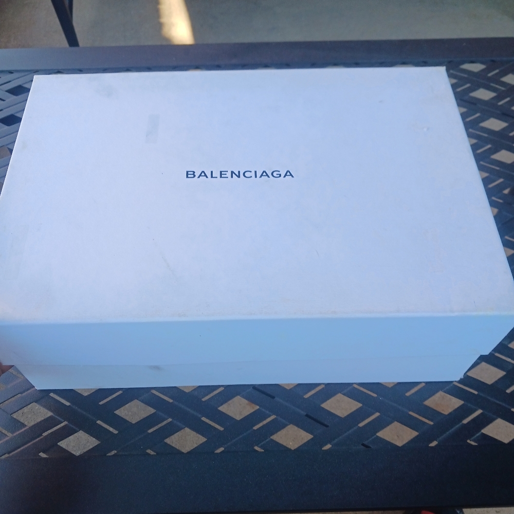 All white low cut Balenciaga shoes